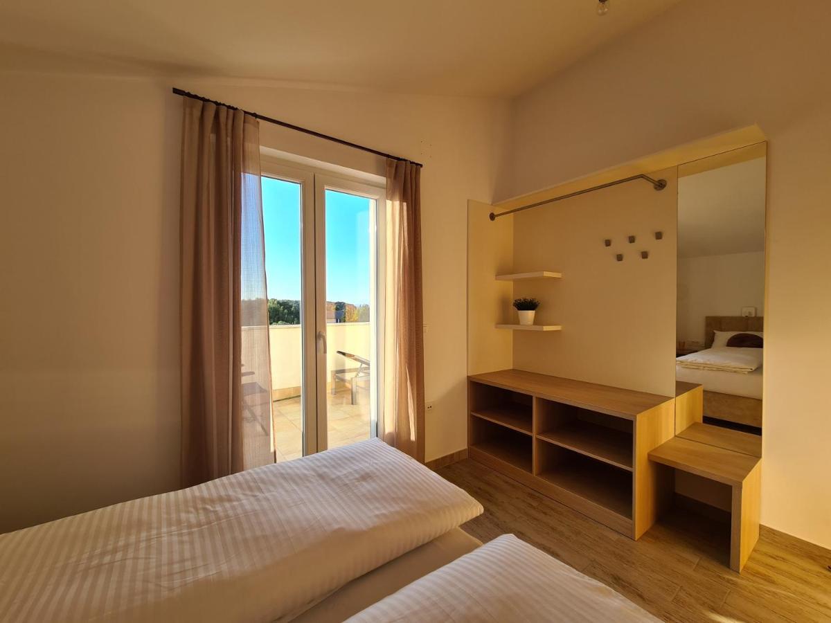 Orkula Apartments Пашман Экстерьер фото