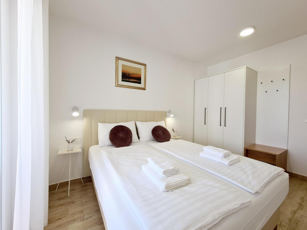Orkula Apartments Пашман Экстерьер фото
