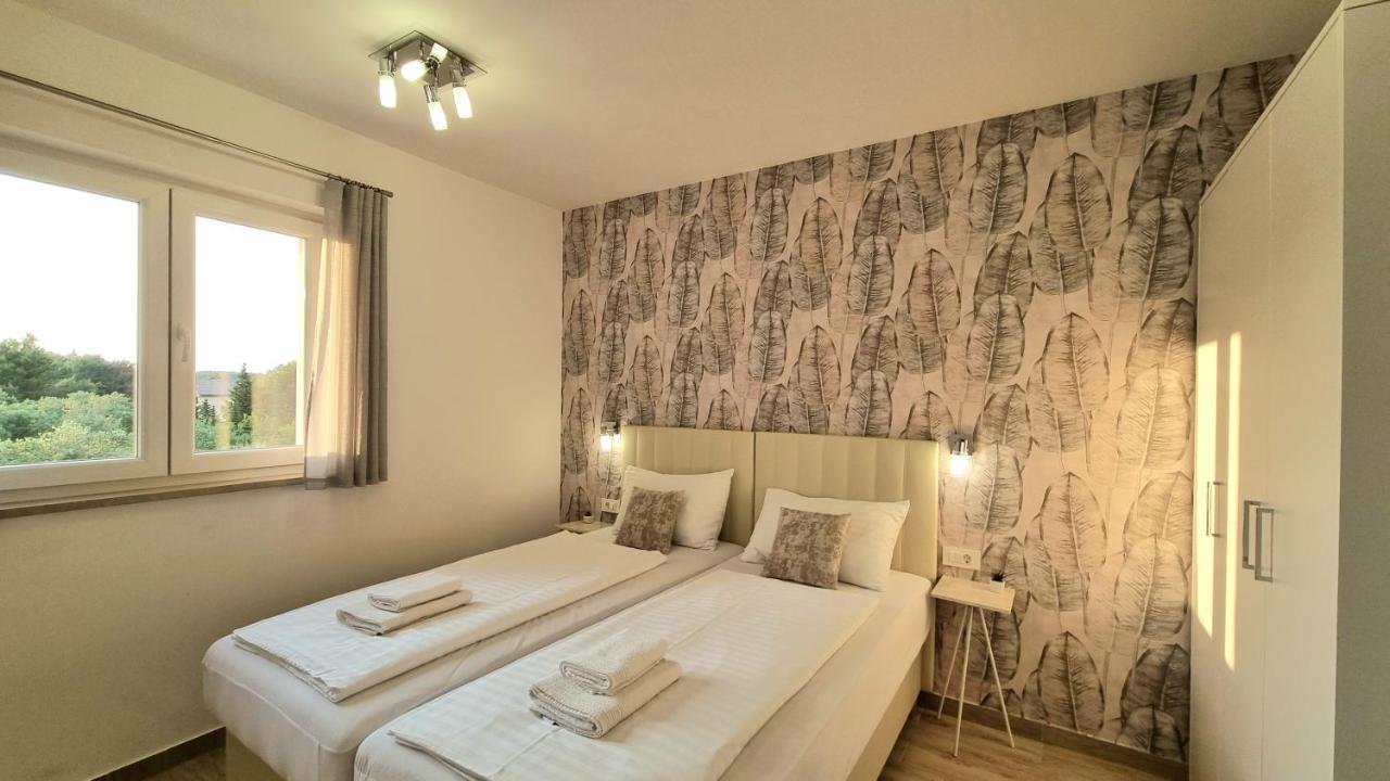 Orkula Apartments Пашман Экстерьер фото