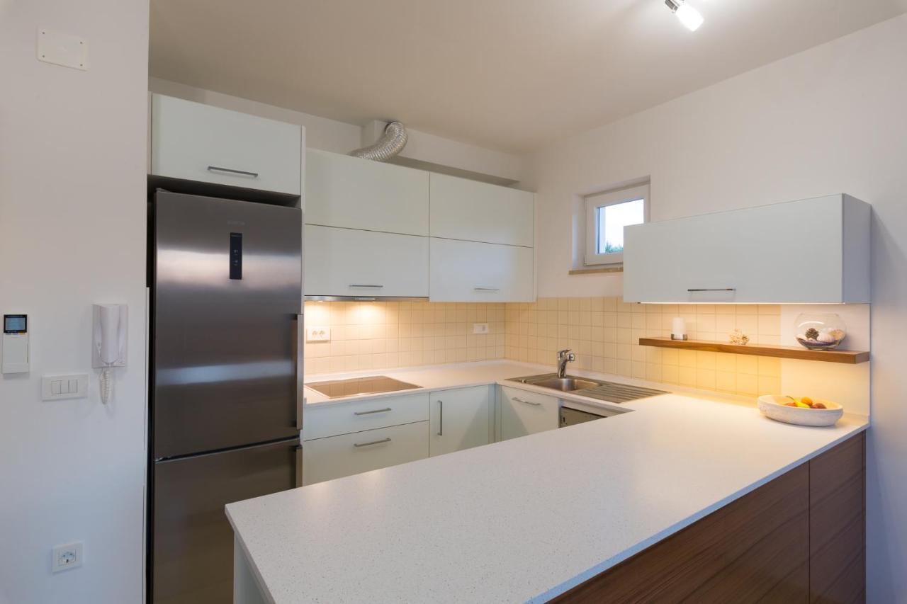 Orkula Apartments Пашман Экстерьер фото